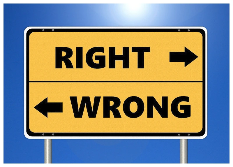 A road sign pointing to right and wrong